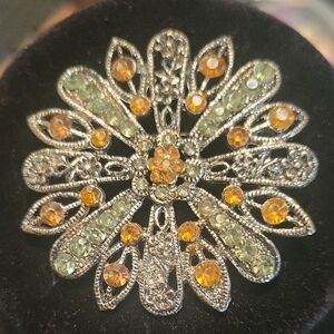 Elegant Silver and Gold Floral Brooch